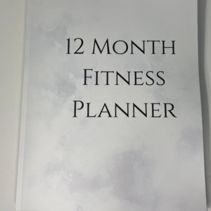 Picture of the title page of a planner. Marble background with black font.
